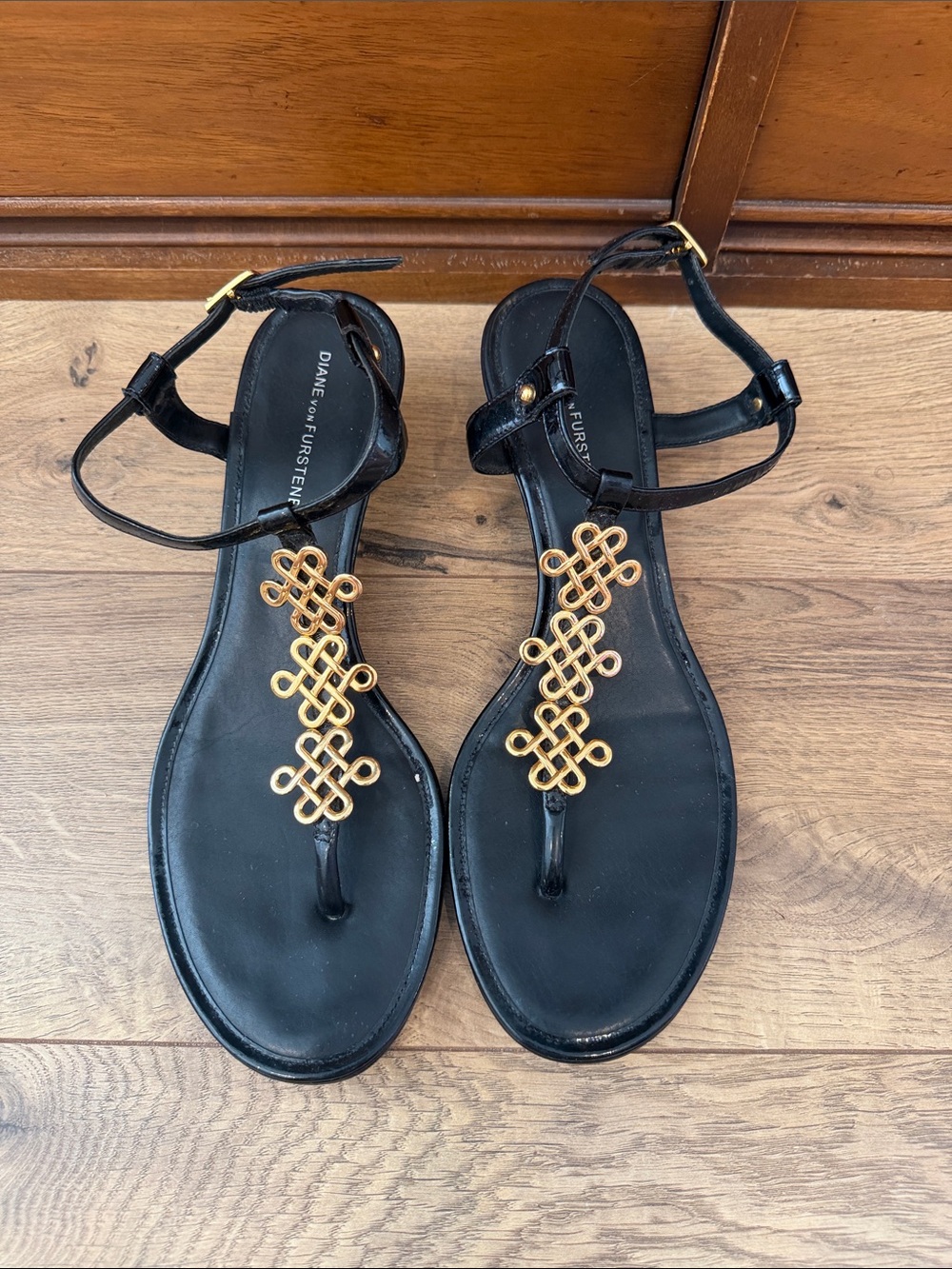 VintagDiane Von Furstenberg Black Leather T-Strap Sandals with Gold Knot Accents
